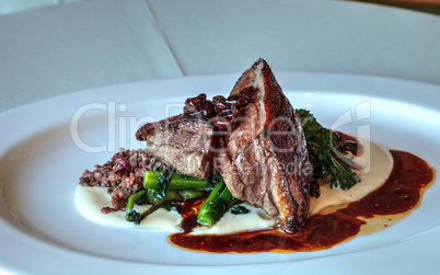 Gourmet roasted duck with raspberry sauce