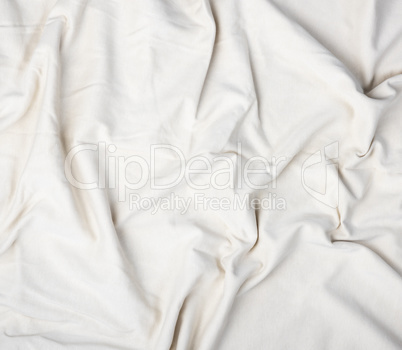 fragment of beige cotton fabric