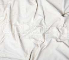 fragment of beige cotton fabric