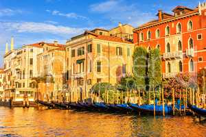 Gondolas nearby old Venice palaces in the Canal near Rialto Brid
