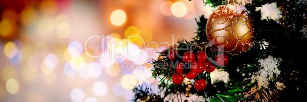 Composite image of christmas yellow circle lights