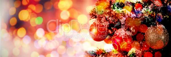 Composite image of christmas yellow circle lights