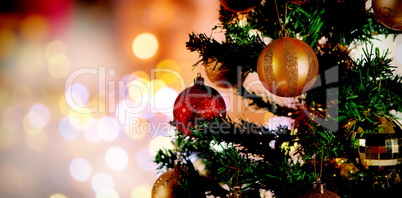 Composite image of christmas yellow circle lights