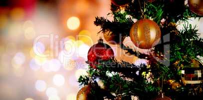 Composite image of christmas yellow circle lights