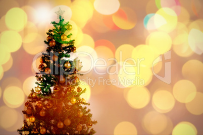 Composite image of defocused of christmas tree lights and fireplace