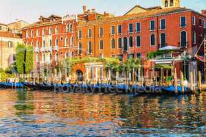 Gondolas in the Grand Canal of Venice near an old venetian palac