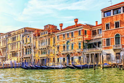 Palaces on the shore of Grand Canal and gondolas rent in Venice