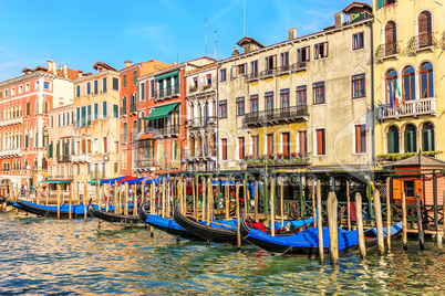 Street cafe in Venice on the pier of gondolas in Grand Canal, It