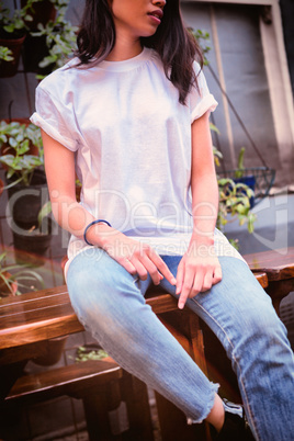 Hipster woman with blank t-shirt for your design