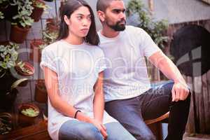 Hipster couple with blank t-shirts for your design