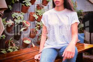 Hipster woman with blank t-shirt for your design