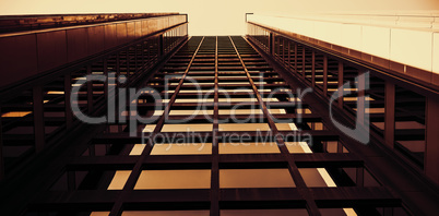 Low angle view of office building against blue sky