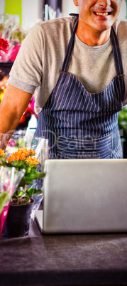 Portrait of happy male florist