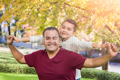 Mixed Race Hispanic and Caucasian Son and Father Having Fun