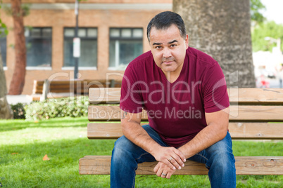 Mixed Race Man on a Park Bench.