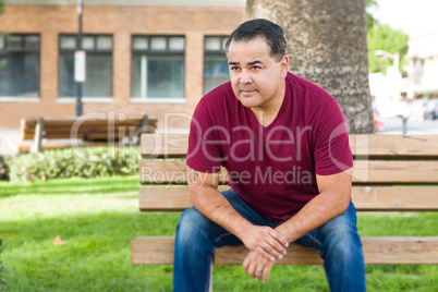 Mixed Race Young Hispanic Man Posing on a Bench