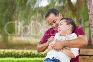 Mixed Race Hispanic Father Tickling His Caucasian Son