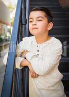 Mixed Race Young Hispanic Caucasian Boy Posing on a Stairway