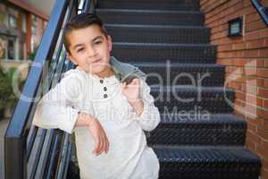 Mixed Race Young Hispanic and Caucasian Boy Posing in a Stairway