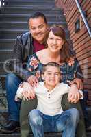 Mixed Race Young Family Portrait on a Stairway