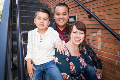 Mixed Race Young Family Portrait on a Stairway