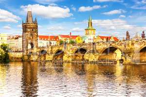 Charles Bridge and view the Tower of Lesser Town of Prague