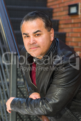 Portrait of Handsome Mixed Race Hispanic Man Posing on a Stairway