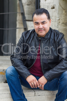 Mixed Race Young Hispanic Man Posing on Steps