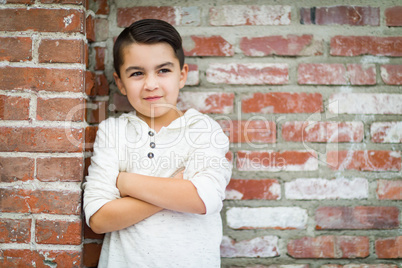 Mixed Race Young Hispanic Caucasian Boy Posing on a Brick Wall