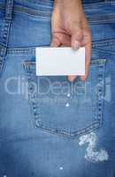 hand holding a blank white rectangular paper business card
