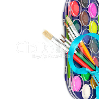 Watercolor paints and brushes isolated on white background. Free