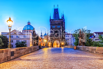 Charles bridge and Old Town of Prague in morning twilight