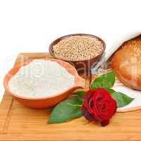 Bread, whole grain and flour isolated on white background.