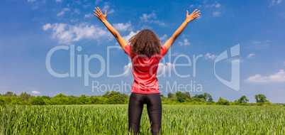 Female Woman Girl Runner Arms Raised in Green Field Panorama