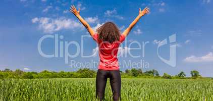 Female Woman Girl Runner Arms Raised in Green Field Panorama