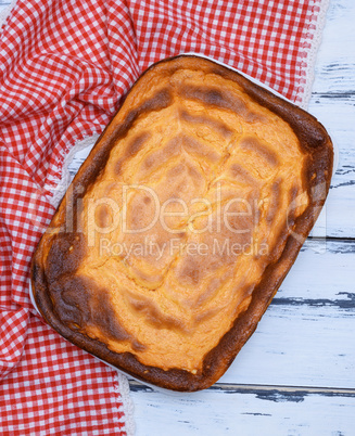 whole rectangular pie of cottage cheese and pumpkin