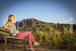 Women sitting on bench in the wine region Baden-Baden Rebland