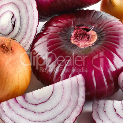 Background of red and white onions. A food set.