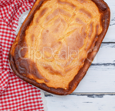 whole rectangular pie of cottage cheese and pumpkin