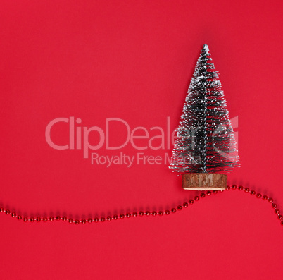 Abstract red christmas background with new year tree