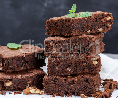 stack of baked square pieces of brownie pie