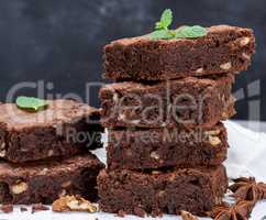 stack of baked square pieces of brownie pie