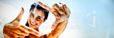 Portrait of smiling woman on the beach