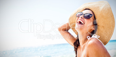 Portrait of smiling woman on the beach