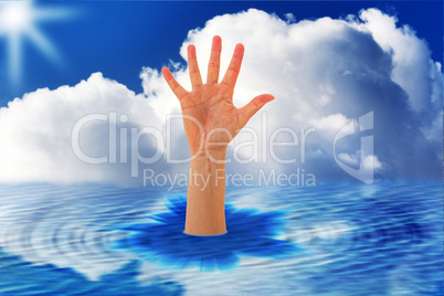 Outstretched hand sticks out of the water