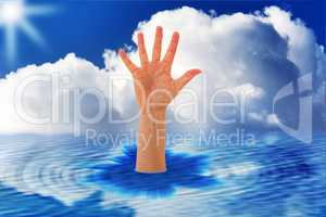 Outstretched hand sticks out of the water