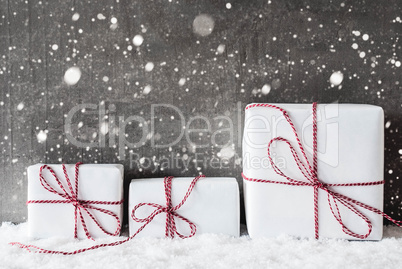 White Gifts With Red Ribbon, Grungy Cement Background, Snowflakes