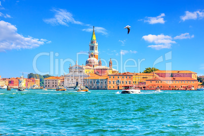 View on Guidecca island with its Church and boats, Venice, Italy