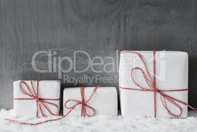 White Gifts With Red Ribbon, Grungy Cement Background, Snow