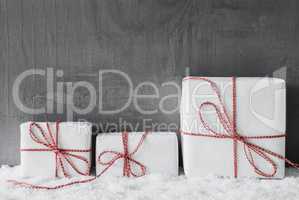 White Gifts With Red Ribbon, Grungy Cement Background, Snow